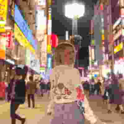 Girl traveller exploring Japanese streets.