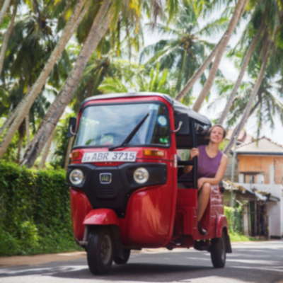 Women traveller taking part in a tuk tuk tour of Negombo.