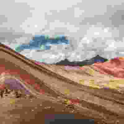 Be amazed by the multi-coloured Rainbow Mountain